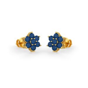 Blue sapphires set in gold in a floral pattern